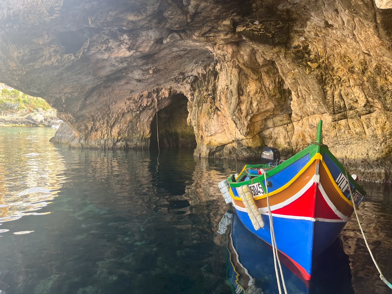 A dgħajsa in a cave in Gozo.
